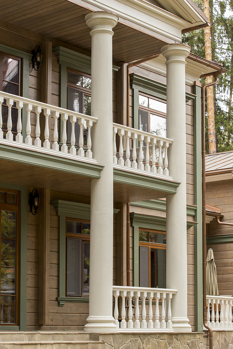 Timber house facade with Gaudi profiles, view 4